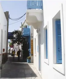  ??  ?? A view down a winding narrow street of the picturesqu­e town of Mandraki, Nisyros.