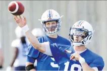  ?? JOHN MAHONEY ?? Sophomore Matt Shiltz, right, and veteran Drew Willy during the first day of Alouettes training camp at Olympic Stadium this week.