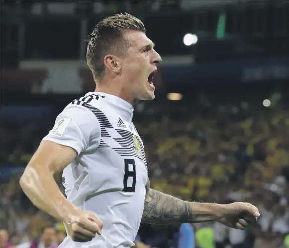  ?? Getty ?? Toni Kroos scored from a set-piece in the closing minutes against Sweden in Sochi to ensure Germany’s first points in Group F