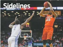  ??  ?? Syracuse guard Tyus Battle, right, shoots over North Carolina forward Theo Pinson during the second round of the Atlantic Coast Conference Tournament on Wednesday in New York.