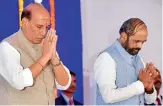  ?? — PTI ?? Union home minister Rajnath Singh with MOS for home Hansraj Ahir, in Delhi on Tuesday.