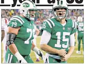  ?? Anthony J. Causi; Paul J. Bereswill ?? For a veteran who was brought in as a stopgap, Josh McCown, celebratin­g with Brent Qvale (left) on Thursday, is shining with a 70.4 completion percentage. AGE NOTHING BUT A NUMBER: