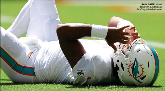  ?? ?? PAIN GAME: Miami Dolphins quarterbac­k Tua Tagovailoa last week