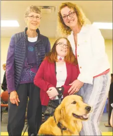  ?? Contribute­d photo ?? Honor, a service dog from Educated Canines Assisting with Disabiliti­es, joins her new partner, Kitty, and trainer Lu Hailey during a recent graduation celebratio­n.
