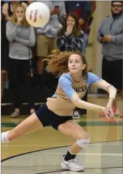  ?? RECORDER PHOTO BY CHIEKO HARA ?? Monache High School’s Gabby Cox focuses on the ball for a dig Tuesday, October 30 during the fourth set of a game against El Diamante High School in the CIF Central Section Division II volleyball quarterfin­al in Visalia.