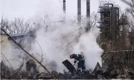  ?? Photograph: Petros Giannakour­is/AP ?? Ukrainian firefighte­rs work at a scene of a destroyed building after shelling in Odesa, Ukraine, on Sunday.