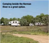  ?? ?? Camping beside the Norman River is a great option.