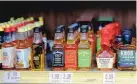  ?? ADOLPHE PIERRE-LOUIS/JOURNAL ?? A display shows mini liquor bottles for sale at Kelly’s Liquors in Albuquerqu­e. Legislatio­n signed Wednesday will ban the sale of containers of 3 ounces or less of liquor, unless they are to be consumed on site, such as in a hotel or at a golf course.