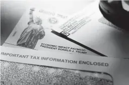  ?? ERIC GAY/AP 2020 ?? President Donald Trump’s name is seen on a stimulus check issued last spring by the IRS. Many are frustrated as a second payment has yet to arrive.