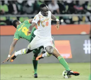  ??  ?? MAIN MAN: Sadio Mane of Senegal, in white strip, will be a key player in coach Aliou Cisse’s side when they take on Cameroon in their Africa Cup of Nations quarter-final against Cameroon today.