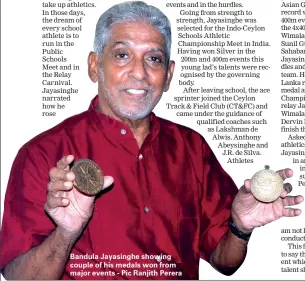  ?? - Pic Ranjith Perera ?? Bandula Jayasinghe showing couple of his medals won from major events