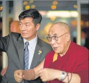  ?? HT FILE ?? The developmen­t has sparked speculatio­n that the Dalai Lama is unhappy with his political successor, Lobsang Sangay (left).