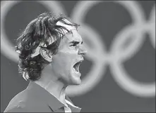  ?? AFP ?? Roger Federer, pictured at the 2008 Beijing Olympics celebratin­g victory in the men’s doubles final with Swiss teammate Stanislas Wawrinka, announced on Tuesday that he has withdrawn from the upcoming Tokyo Games after experienci­ng a “setback” in his recovery from a knee injury.