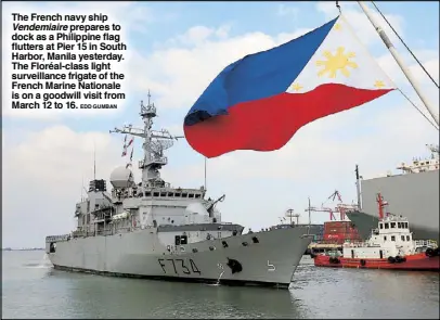  ?? EDD GUMBAN ?? The French navy ship
Vendemiair­e prepares to dock as a Philippine flag flutters at Pier 15 in South Harbor, Manila yesterday. The Floréal-class light surveillan­ce frigate of the French Marine Nationale is on a goodwill visit from March 12 to 16.