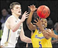  ?? KATHY WILLENS / AP ?? Tech’s Ben Lammers and Cal State Bakersfiel­d’s Dedrick Basile reach for a loose ball Tuesday. Lammers had 15 points, 11 rebounds and five blocks.