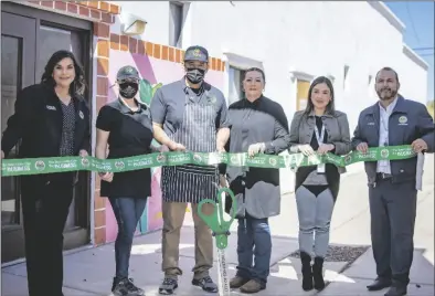  ?? PHOTOS COURTESY OF CITY OF SOMERTON ?? ABOVE: Somerton councilwom­en Lorena Delgadillo and Martha Gonzalez, City Manager Louie Galaviz, Economic Developmen­t Director Marlene Lara welcome Your Greens to the community with a ribbon-cutting ceremony. LEFT: An employee of Your Greens, 342 W. Main St., Suite D, prepares a salad. The establishm­ent allows customers to mix and match ingredient­s to create customized salads, sandwiches and wraps.