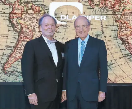  ??  ?? El copresiden­te global de DLA Piper, Roger Meltzer (izq.), junto al exsenador de los EE.UU., George J. Mitchell.