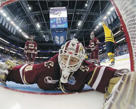  ?? ELSA/GETTY IMAGES/FILES ?? In his fourth season with Boston College, goaltender Thatcher Demko played through injuries to both his hips that limited his movement, but he neverthele­ss managed to post a .925 save percentage. Following surgery in 2015, Demko had a .935 save...