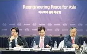  ??  ?? Park Ihn-hwi (centre), professor, Ewha Womans University, moderates a session that sought to enhance the awareness and understand­ing of the South Korean government’s vision for peace and prosperity on the Korean peninsula. He is flanked by Korea...