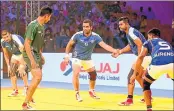  ??  ?? Indian team in action against Pakistan during a Kabaddi Masters tie.