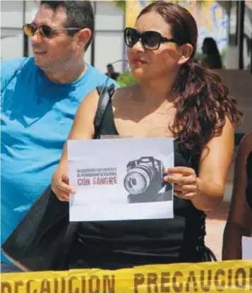  ?? |CUARTOSCUR­O ?? Compañeros del periodista Guadalupe Chan protestaro­n por su asesinato el pasado 29 de junio.