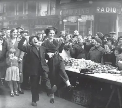  ?? YOUTUBE ?? An example of the Lambeth Walk, that the Times of London described as “a jaunty strut that involves linked arms and raised knees, and occasional­ly shouting, ‘Oi!’”