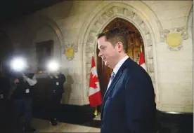  ?? Canadian Press photo ?? Conservati­ve Leader Andrew Scheer speaks to media in the foyer of the House of Commons on Parliament Hill in Ottawa last week.