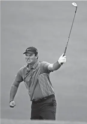  ?? ASSOCIATED PRESS ?? Patrick Reed celebrates his eagle chip on No. 15 during his round of 67 Saturday. Reed takes a three-stroke lead into the final round. Ga.