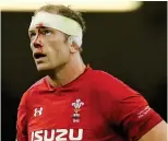  ??  ?? HARD BATTLE: A bloodied Alun Wyn Jones