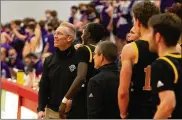  ?? JEFF GILBERT / CONTRIBUTE­D ?? Centervill­e coach Brook Cupps smiles as he and his team watch the final seconds tick off the clock in Wednesday night’s Division I regional semifinal at Princeton High School.