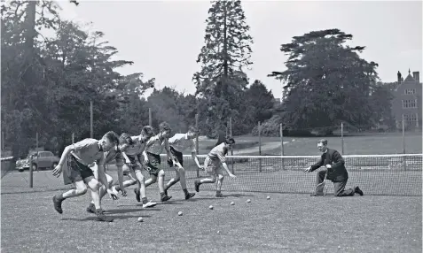  ??  ?? Goldings boys being trained to be Wimbledon ball boys at their school in 1958