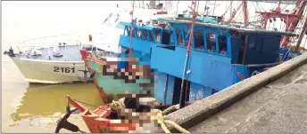  ??  ?? The two trawlers detained and berthed at LKIM Jetty.