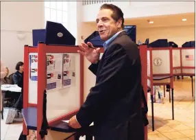  ?? Richard Drew / Associated Press ?? In this Nov. 6, 2018 file photo, New York Gov. Andrew Cuomo pauses as he marks his ballot, at the Presbyteri­an Church of Mount Kisco, in Mt. Kisco, N.Y. New York’s attorney general has promised a thorough investigat­ion of allegation­s that Cuomo sexually harassed at least two women.