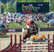  ?? TANIA BARRICKLO — DAILY FREEMAN FILE ?? Heather Caristo-Wiliams of Saugerties rides Evening Star in the 2015 $1 Million Grand Prix at HITS in Saugerties.