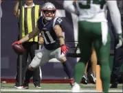 ?? STEVEN SENNE - THE ASSOCIATED PRESS ?? New England Patriots wide receiver Julian Edelman winds up to spike the ball after catching a touchdown pass against the New York Jets in the first half of an NFL football game, Sunday, Sept. 22, 2019, in Foxborough, Mass.