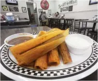  ?? ?? Tamales at Pea Soup’s Lott-a-Freeze in Indianola, Miss., are served with chili and homemade ranch dressing.