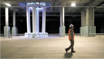  ?? Liz Hafalia / The chronicle ?? Engineer Skip Sowko shows the train box, the Salesforce Transit Center’s cavernous basement.