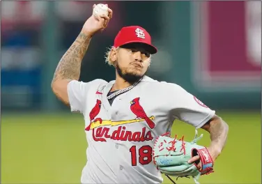  ?? Associated Press ?? To the plate: In this Wednesday, Sept. 23, 2020 file photo, St. Louis Cardinals relief pitcher Carlos Martinez throws during the first inning of a baseball game against the Kansas City Royals in Kansas City, Mo.