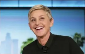  ?? ANDREW HARNIK — THE ASSOCIATED PRESS FILE ?? In this file photo, Ellen Degeneres appears during a commercial break at a taping of “The Ellen Show” in Burbank, Calif.