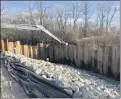  ?? PHOTO COURTESY MACOMB COUNTY PUBLIC WORKS OFFICE ?? The complete steel sheeting that was in place in 2019as part of the extensive effort to halt the flow of old diesel fuel that had leaked in the Bear Creek Drain.