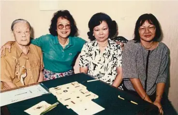  ??  ?? Lee (second from left) has been playing bridge for over 40 years; this was a game with friends in 1992. — HILDAH LEE