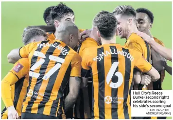  ?? CAMERASPOR­T - ANDREW KEARNS ?? Hull City’s Reece Burke (second right) celebrates scoring his side’s second goal