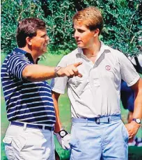  ?? COURTESY OF RICK BULLOCK ?? Steve Loy, left, gives a pointer to Phil Mickelson when the two were young. Loy, a Sandia High alumnus, coached Mickelson to collegiate success at Arizona State, then became his agent.