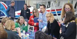  ??  ?? Principals collaborat­e during profession­al developmen­t day at Livermore airport.