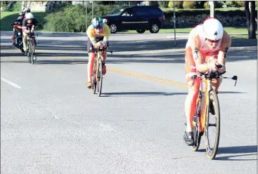  ??  ?? Spain’s Javier Gomez leads a group of triathlete­s during the 56-mile bike ride through Walker County on Sunday. Gomez would go on to win the Ironman 70.3 World Championsh­ip. (Messenger photo/Scott Herpst) Gordon Lee 6, Darlington 3