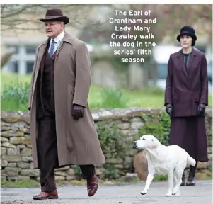  ??  ?? The Earl of Grantham and Lady Mary Crawley walk the dog in the series’ fifth
season