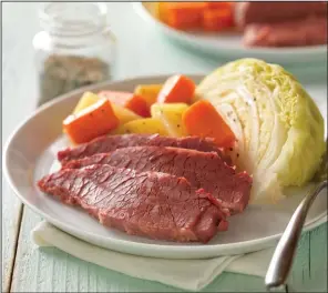  ?? (Courtesy of Cattlemen’s Beef Board) ?? Classic Corned Beef With Cabbage and Potatoes