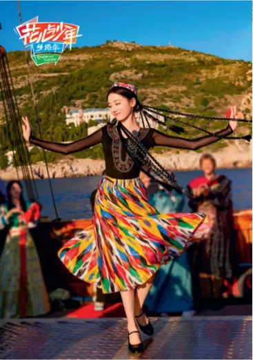  ?? ?? Dilraba Dilmurat dances during the taping of the Divas Hit the Road Season V travel show in Croatia in 2023