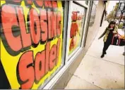  ?? Scott Olson Getty Images ?? SINCE THE bankruptcy filing, Sears has announced 182 store closures. Above, the last Sears in Chicago.