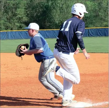  ??  ?? Rossville first baseman Houston Henry makes a catch to force out Gordon Lee’s Henry Ellis during an game in Chickamaug­a this past Thursday. (Messenger photo/Scott Herpst)